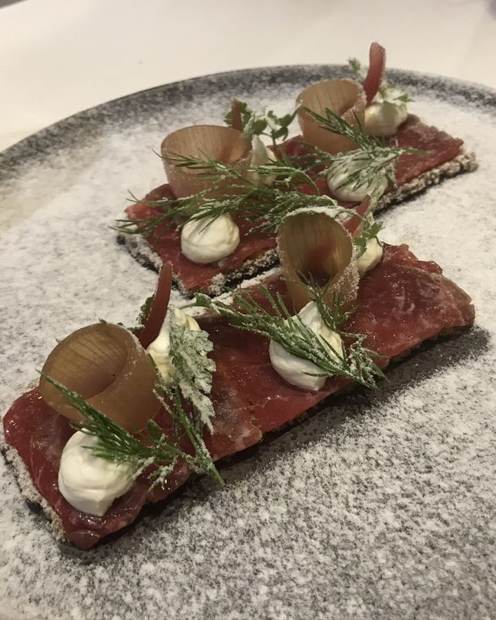 Cured beef on rye crisps with horseradish cream and dill, refined canape by chef Troy Davidson