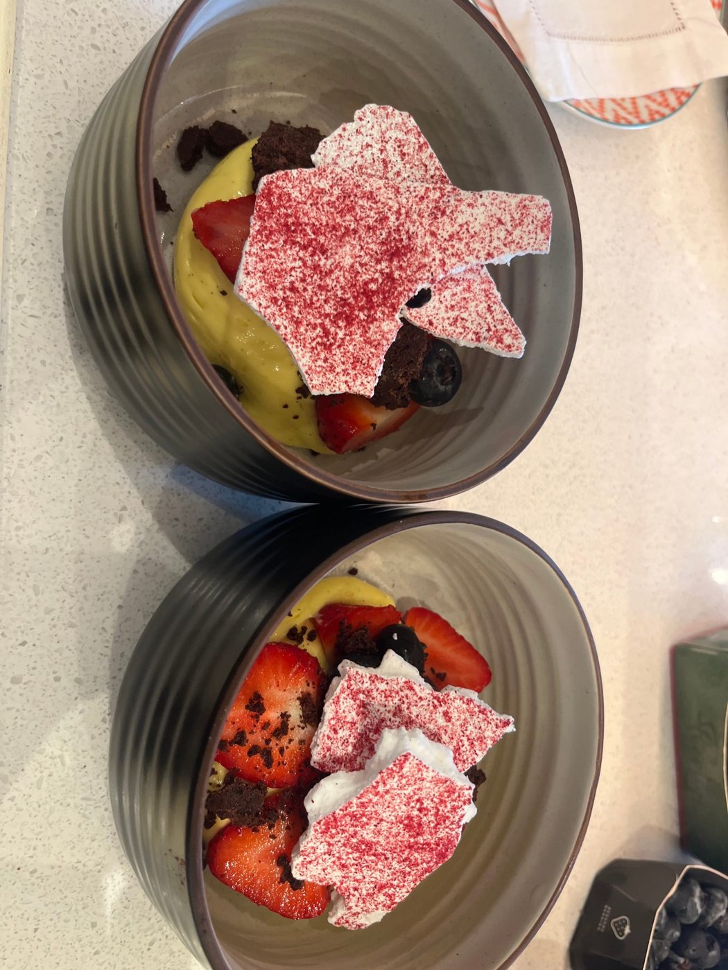 Strawberries, vanilla custard, chocolate crumb and raspberry-dusted meringue shards by chef Troy Davidson